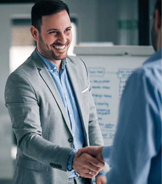 Man in suit shaking hands